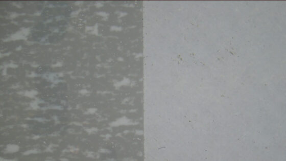 Glass coating removal with laser